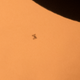 Could be mistaken for a sun spot.